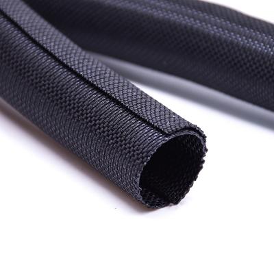 Envoltório de chicote elétrico tubular bipartido tecido